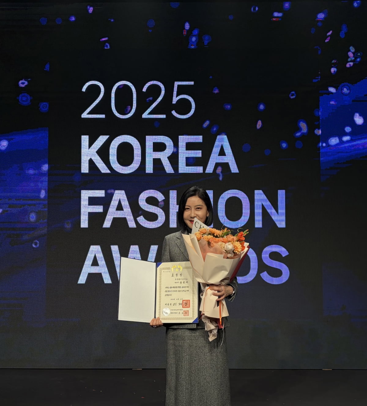 에코마케팅, 공성아 안다르 대표 '대한민국 패션대상' 대통령 표창 수... - 뉴스 썸네일 이미지